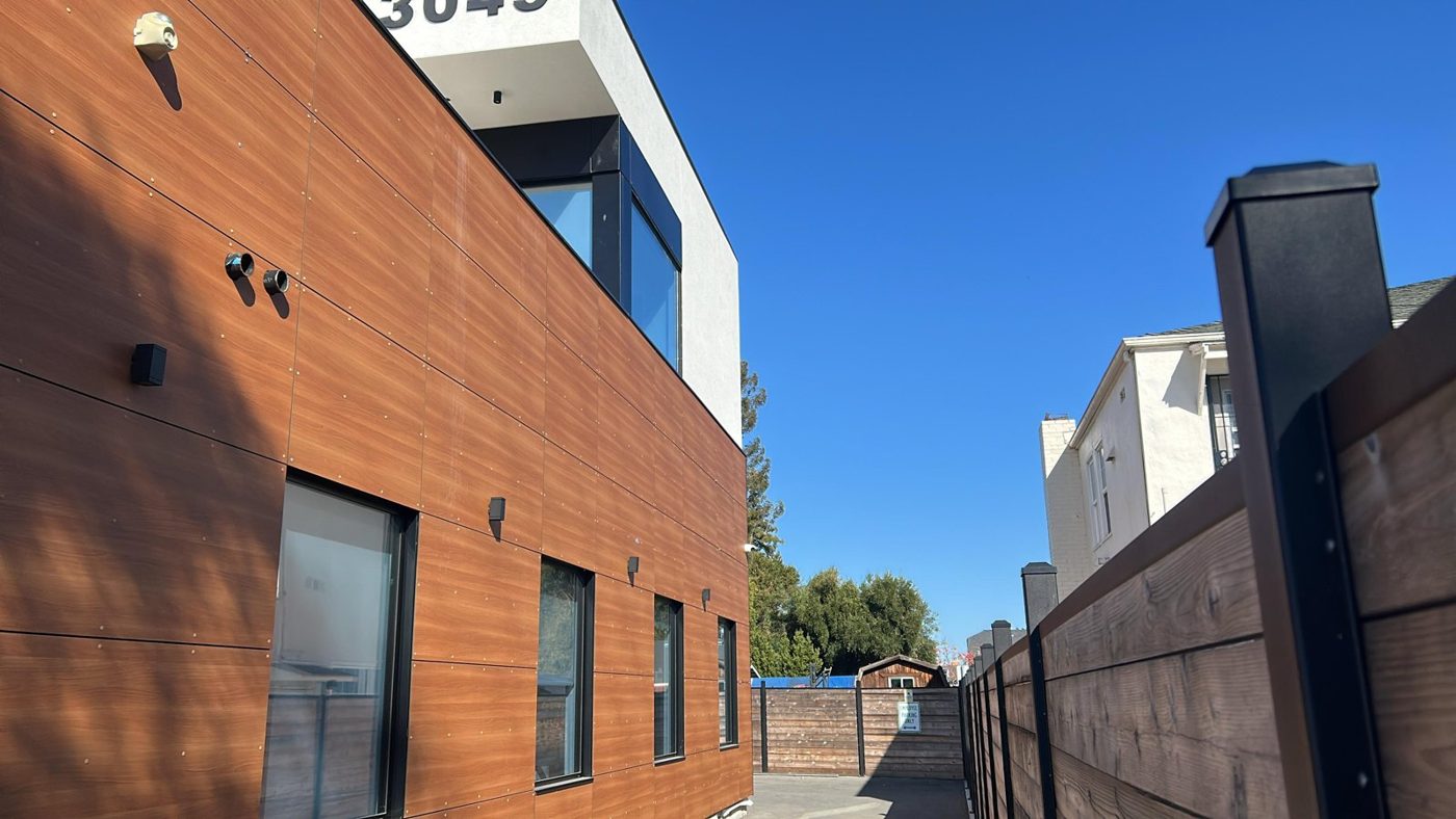 Commercial industrial building with solar control window film on upper-level windows
