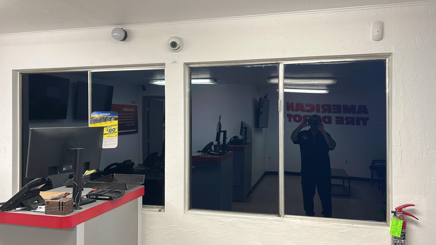 Service counter interior glass fitted with dark privacy film