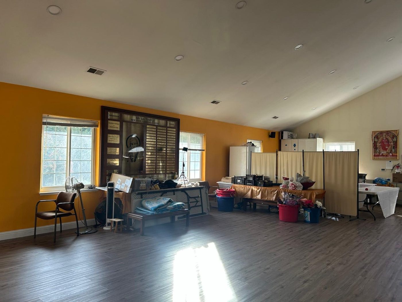 Community hall interior with safety film on the windows