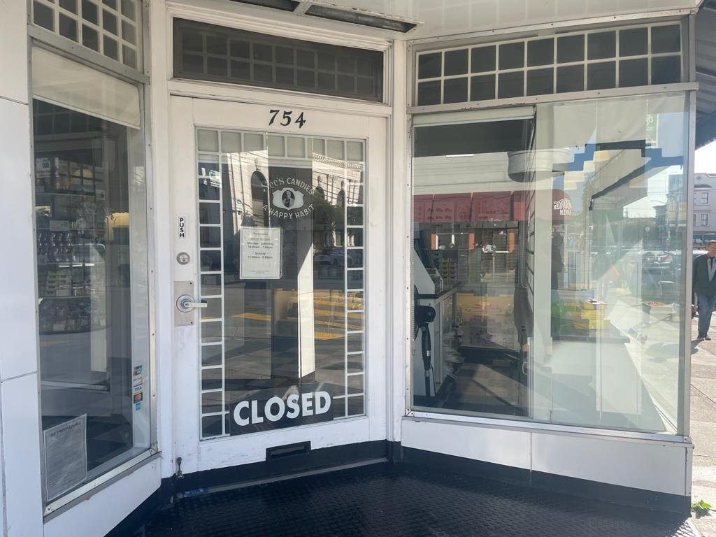 Retail storefront glass protected with anti-graffiti window film