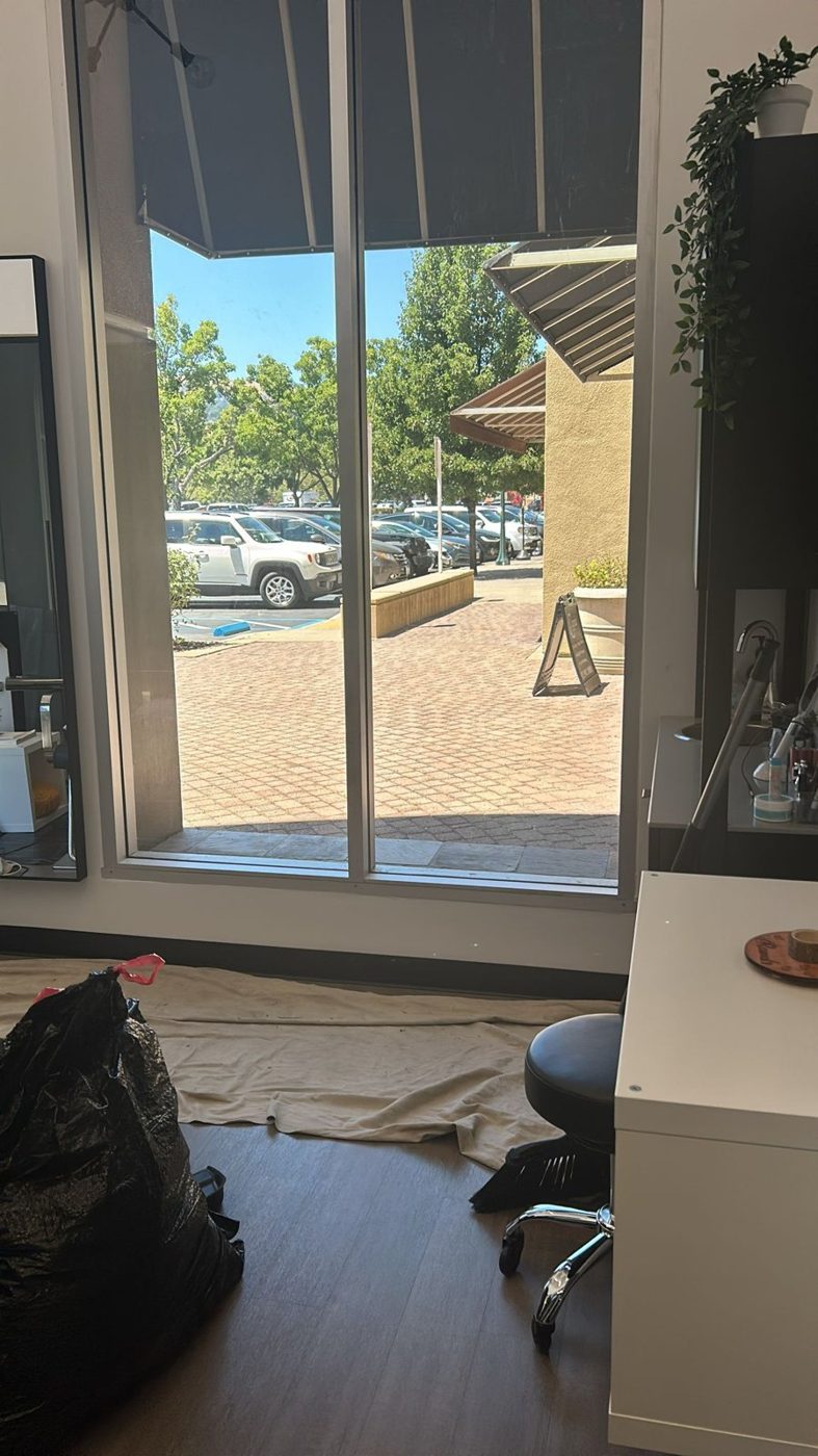 Retail storefront doors and windows with solar window film